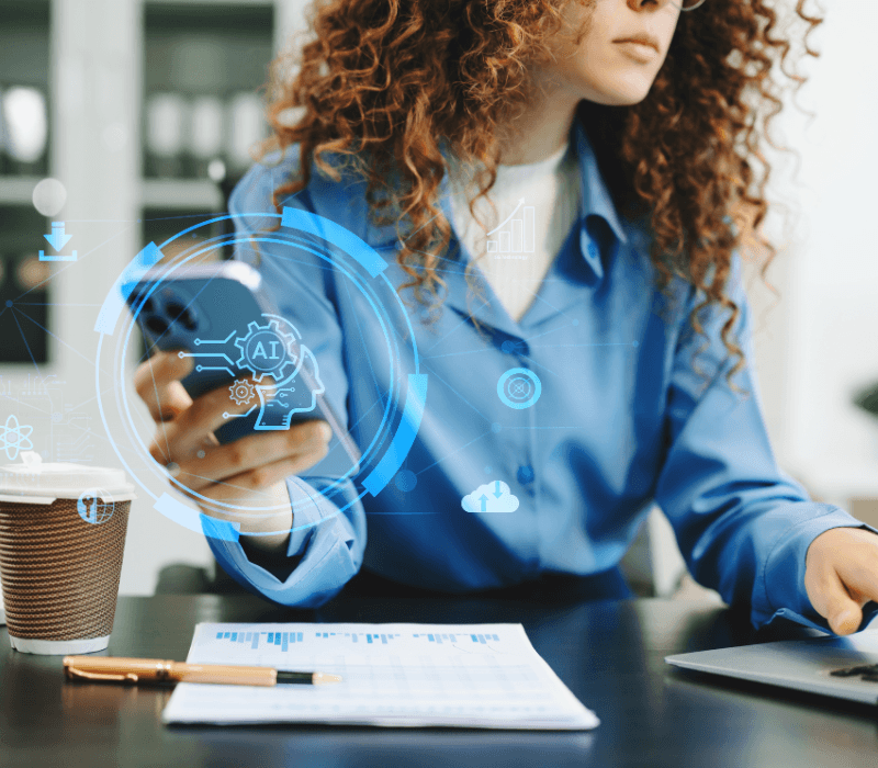 Woman focused at her laptop in a café